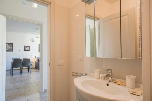 a bathroom with a sink and a mirror at Borgo Guelfo I in Florence
