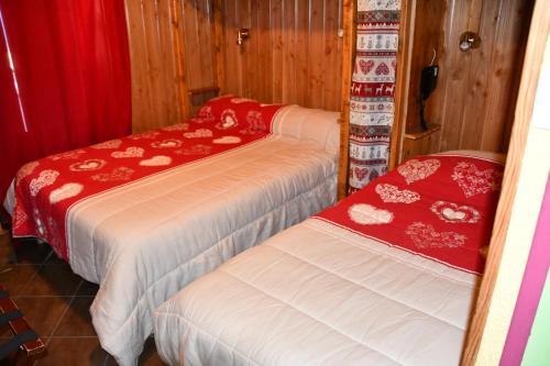 Postel nebo postele na pokoji v ubytování Hotel Le Terminus