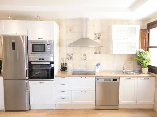 Η κουζίνα ή μικρή κουζίνα στο Apartamentos Sol Real