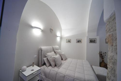 Postel nebo postele na pokoji v ubytování Borgo Martino