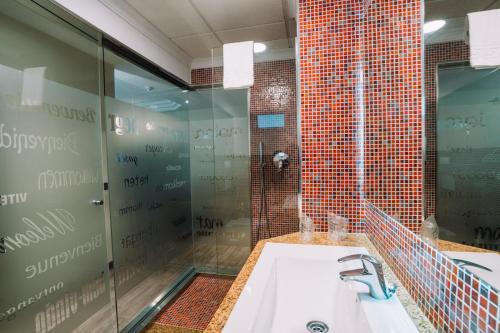Een badkamer bij Park Club Europe - All Inclusive Resort