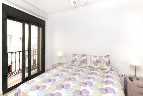Postel nebo postele na pokoji v ubytování Cubo's Apartamento Espana Fuengirola 2B