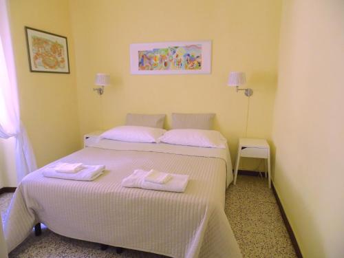 Ένα ή περισσότερα κρεβάτια σε δωμάτιο στο Casa Alba
