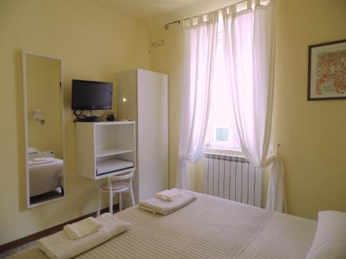 Ένα ή περισσότερα κρεβάτια σε δωμάτιο στο Casa Alba