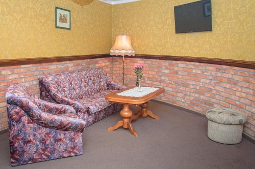 Posezení v ubytování Hotelik Wulpink Majdy Olsztyn