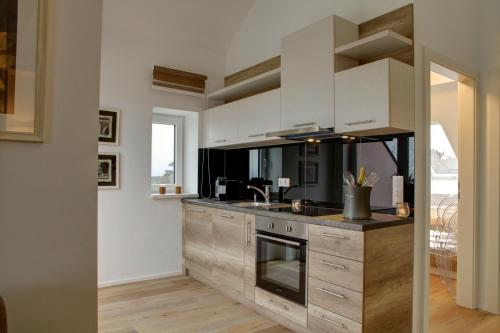 Dapur atau dapur kecil di Triangle Apartments