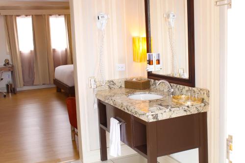 Postel nebo postele na pokoji v ubytování Hotel Zima