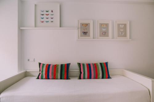 Posteľ alebo postele v izbe v ubytovaní Apartamento Malagueta Playa