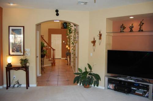 a living room with a large flat screen tv at Beautiful Home in Quiet Area in San Jose