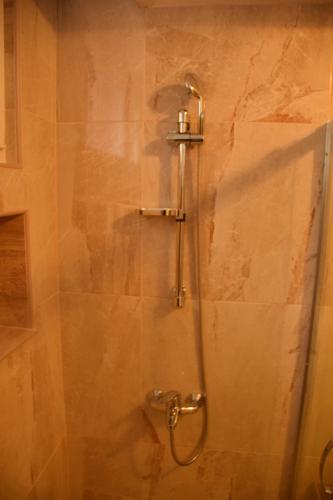 Bilik mandi di Comfort Inn Apartment