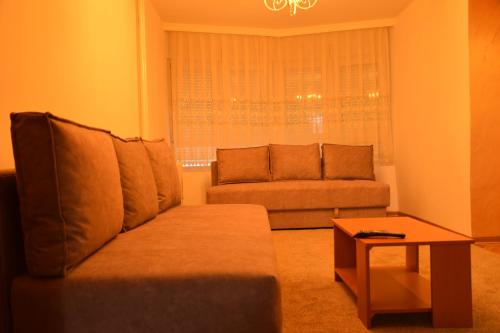 Ruang duduk di Comfort Inn Apartment