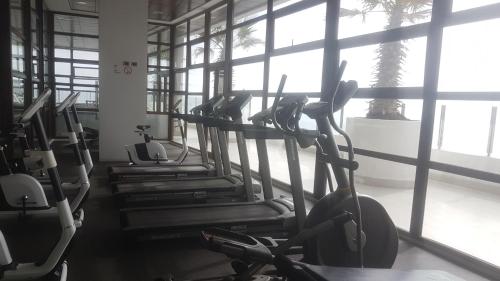 a row of exercise bikes in a gym at Jardin del Mar SPA & Enjoy in Coquimbo