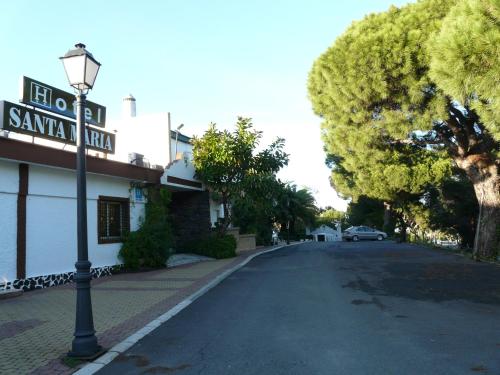 a street with a street light on the side of a road at Hotel Santa María in Palos de la Frontera