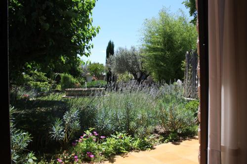 Κήπος έξω από το Villa Thebaïde Chambres d'hôtes