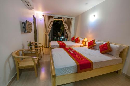 Ένα ή περισσότερα κρεβάτια σε δωμάτιο στο Hue Homestay Riverside