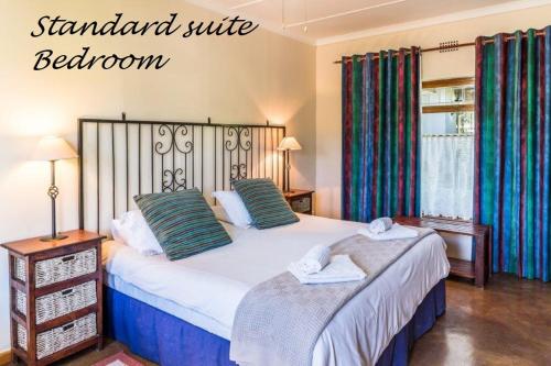 Cama o camas de una habitación en Karoo Lodge