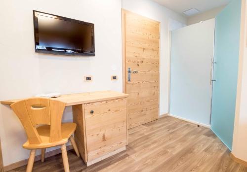 TV a/nebo společenská místnost v ubytování Hotel Garni Snaltnerhof