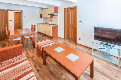 TV a/nebo společenská místnost v ubytování EA Apartmány na Filipce