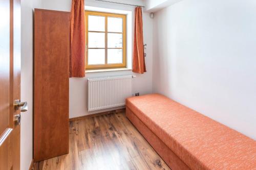 Postel nebo postele na pokoji v ubytování EA Apartmány na Filipce