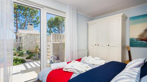 Posteľ alebo postele v izbe v ubytovaní Luxury apartment Loreta
