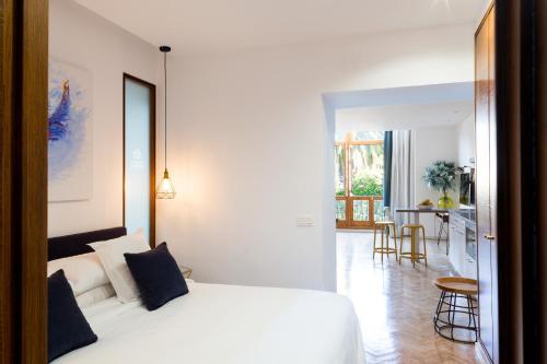 Posteľ alebo postele v izbe v ubytovaní Puerta Catedral Indias Lofts