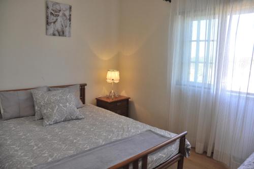 Katil atau katil-katil dalam bilik di Casa Serra e Mar