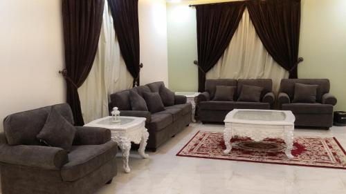 Χώρος καθιστικού στο Ashbilia Suites