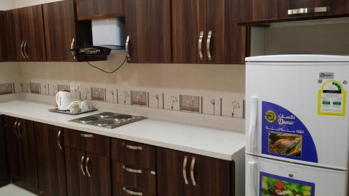 Η κουζίνα ή μικρή κουζίνα στο Ashbilia Suites