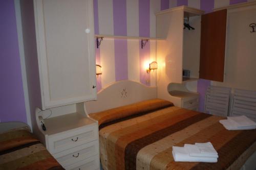 Letto o letti in una camera di Hotel Villa Pina