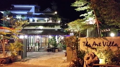 a view of a restaurant at night at Art Villa in Alor Setar