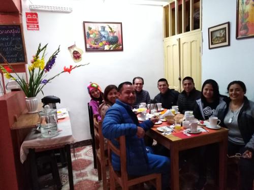 A restaurant or other place to eat at Hostel Qoricancha Cusco
