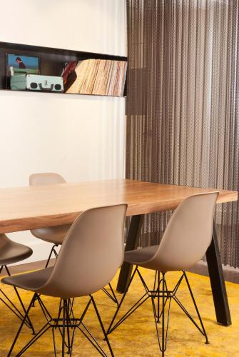 a wooden table with four chairs around it at Stanford Court San Francisco in San Francisco
