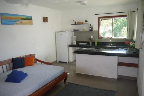 Η κουζίνα ή μικρή κουζίνα στο Casa 3 Verde, Condominio VilaZion, Arraial D'Ajuda centro