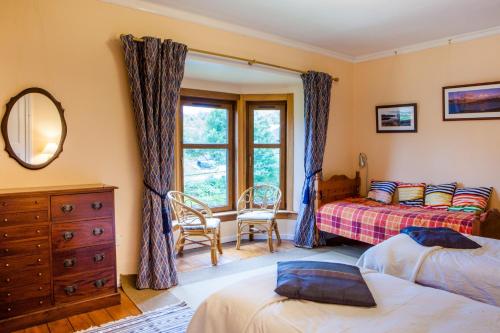 Ένα ή περισσότερα κρεβάτια σε δωμάτιο στο Shelburne Lodge