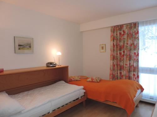 レンツァーハイデにあるAstoria (174 Se)のベッドルーム1室(ベッド2台、窓付)