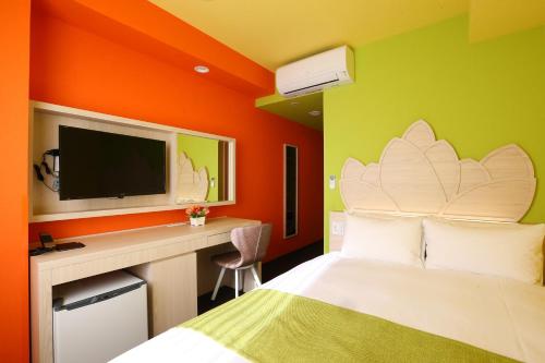 Кровать или кровати в номере Hotel Wing International Select Nagoya Sakae