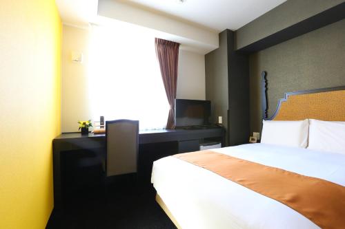 Кровать или кровати в номере Hotel Wing International Select Nagoya Sakae