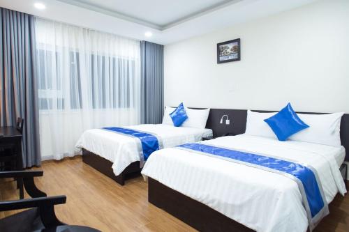 Katil atau katil-katil dalam bilik di SoLex Hotel