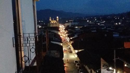 a view of a city street at night at Hostal El Eden in Zacatlán