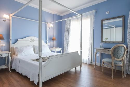 Ένα ή περισσότερα κρεβάτια σε δωμάτιο στο PEPO'S GUESTHOUSE