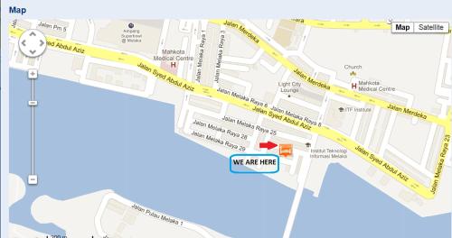 a map of the city of melbourne with a street sign at Harbour Inn in Melaka