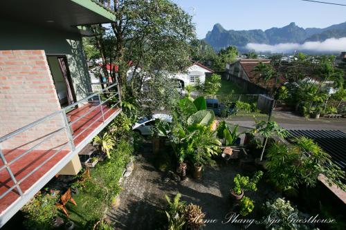 a view from the balcony of a house with plants at Home Phang-Nga Guesthouse in Phangnga