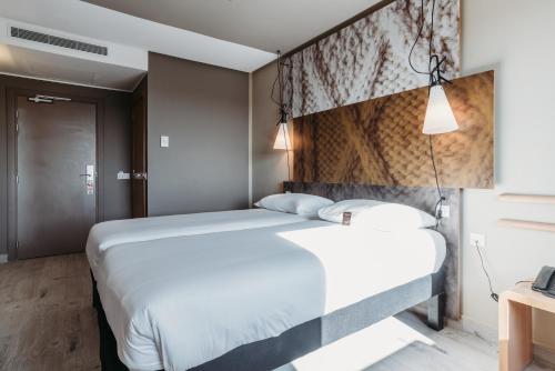 Cama o camas de una habitación en Ibis Mohammedia