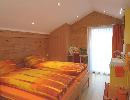 A bed or beds in a room at Sunnegga