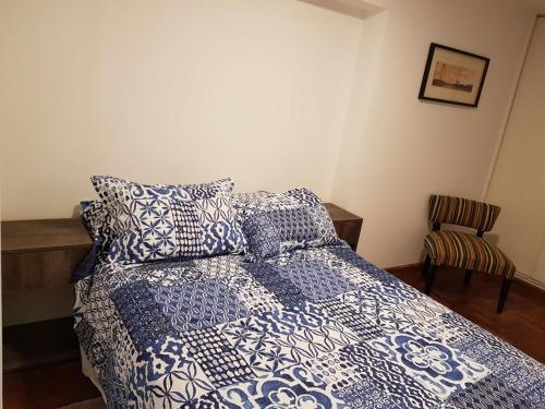 Llit o llits en una habitació de Apartamento Carlucci
