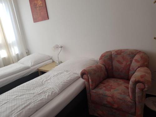 Ένα ή περισσότερα κρεβάτια σε δωμάτιο στο Hotel Wandsbek Hamburg
