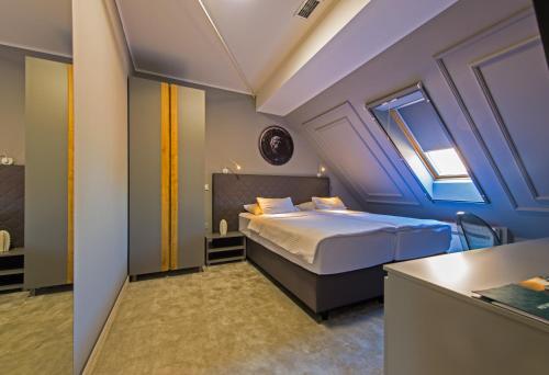 Katil atau katil-katil dalam bilik di Sobe Merlon