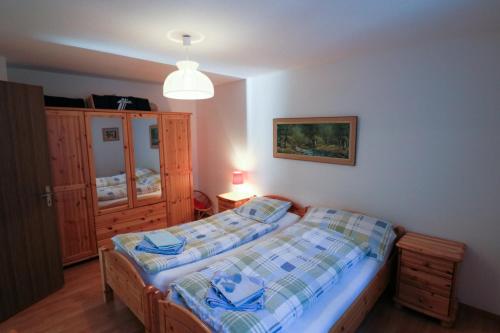 Ένα ή περισσότερα κρεβάτια σε δωμάτιο στο Haus Bündabrücke - Mosbacher