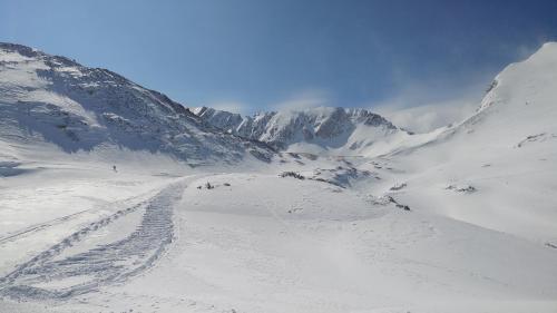 a group of people skiing down a snow covered mountain at Haus Susanne in Radstadt