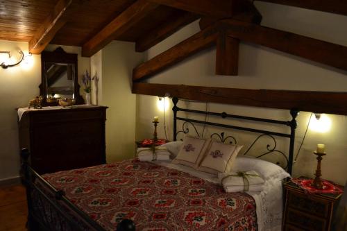 A bed or beds in a room at B&B Palazzo La Loggia